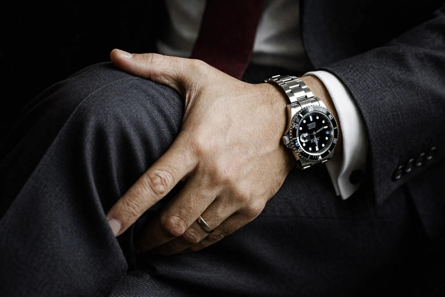 Rolex Submariner replica worn in office setting showcasing elegance and sophistication in a professional business environment