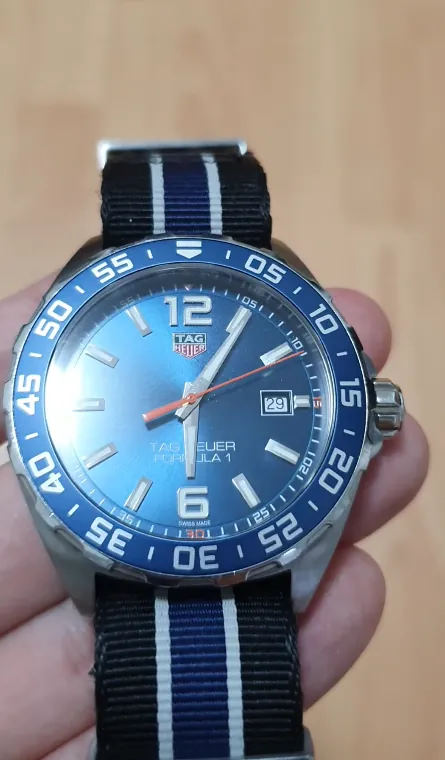 TAG Heuer Formula 1 blue dial watch in hand