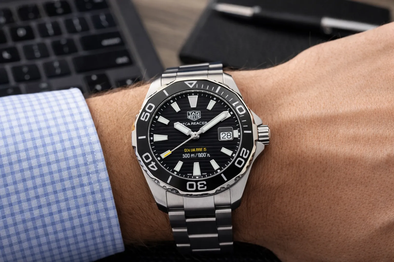 tag heuer replica watch worn on wrist in office environment showing practical daily use