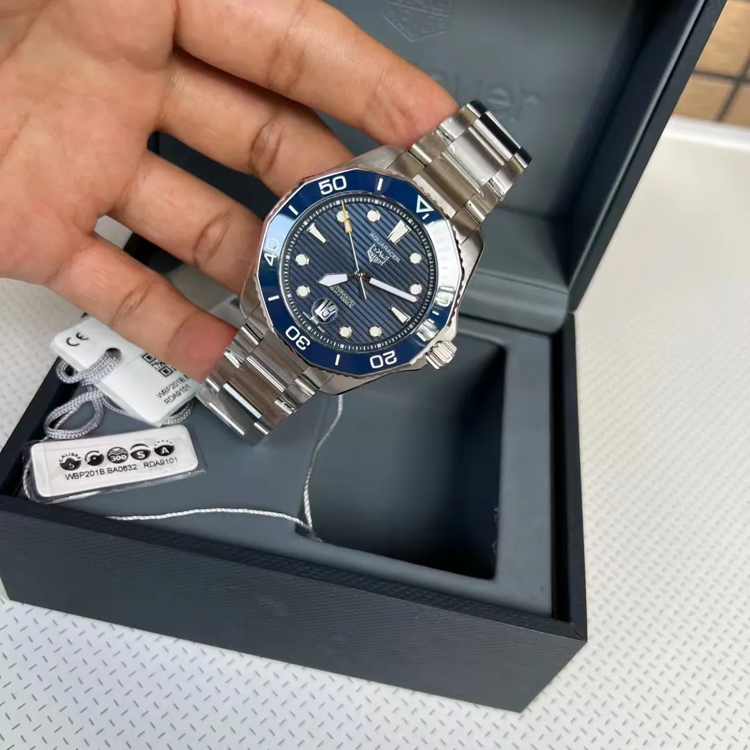TAG Heuer Aquaracer Automatic Blue Dial Men's Watch in hand