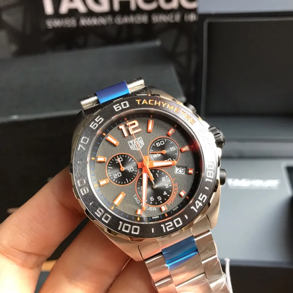 TAG Heuer Formula 1 43mm Men's Watch Black and Orange Dial in hand